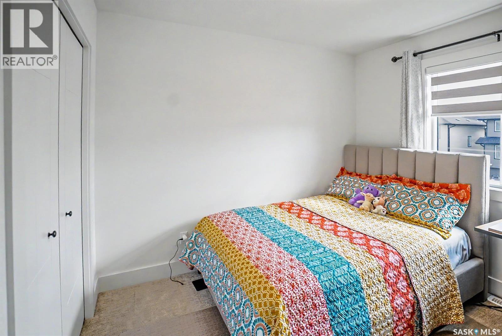 138 Rosewood Boulevard E, Saskatoon, SK - Indoor Photo Showing Bedroom