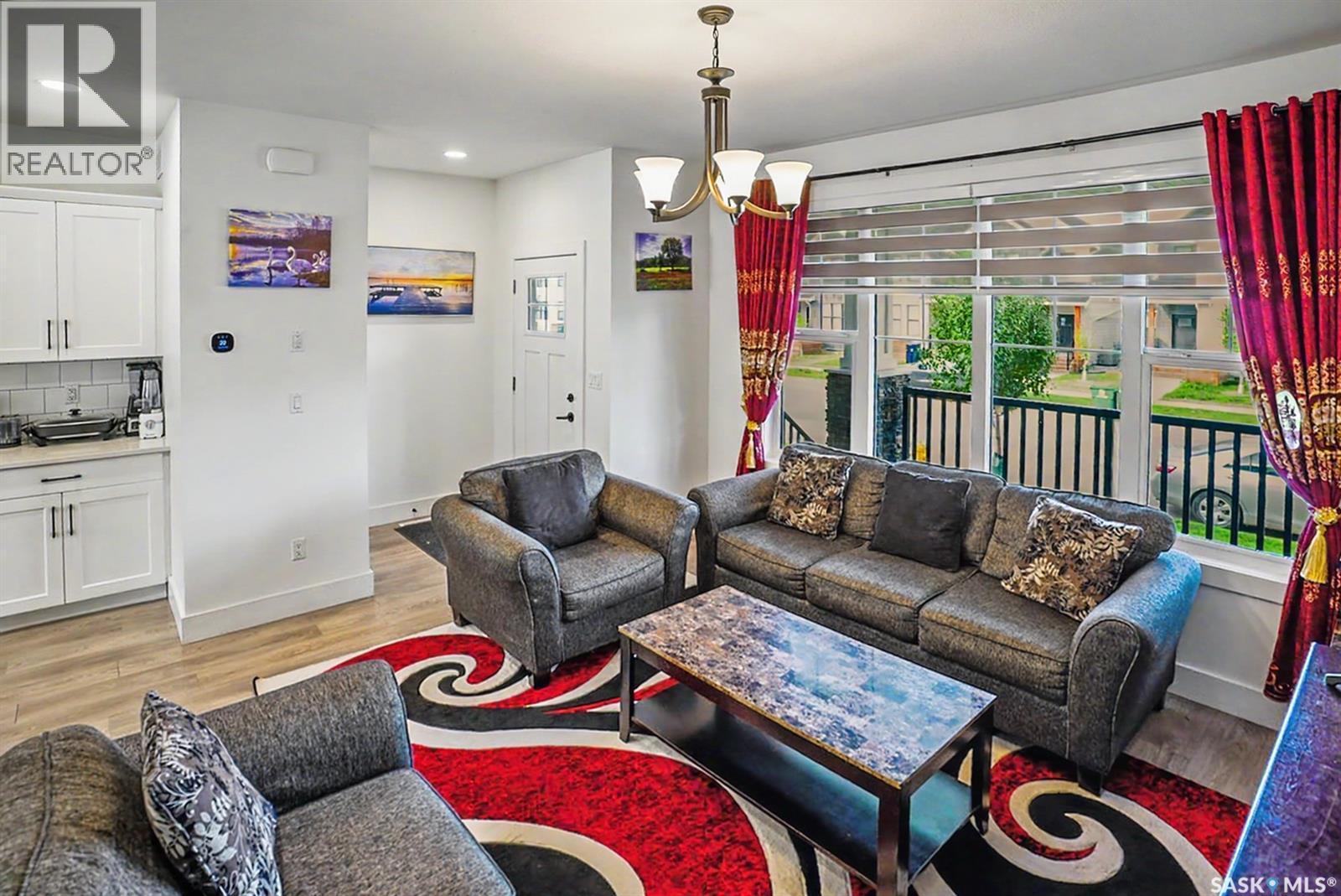 138 Rosewood Boulevard E, Saskatoon, SK - Indoor Photo Showing Living Room