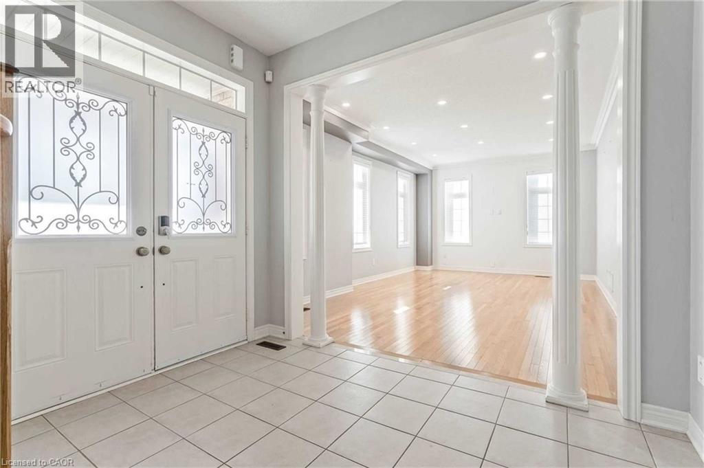 Entryway with ornate columns, light tile patterned floors, recessed lighting, and french doors - 3 Coolwater Drive Unit# Upper, Brampton, ON - Indoor Photo Showing Other Room