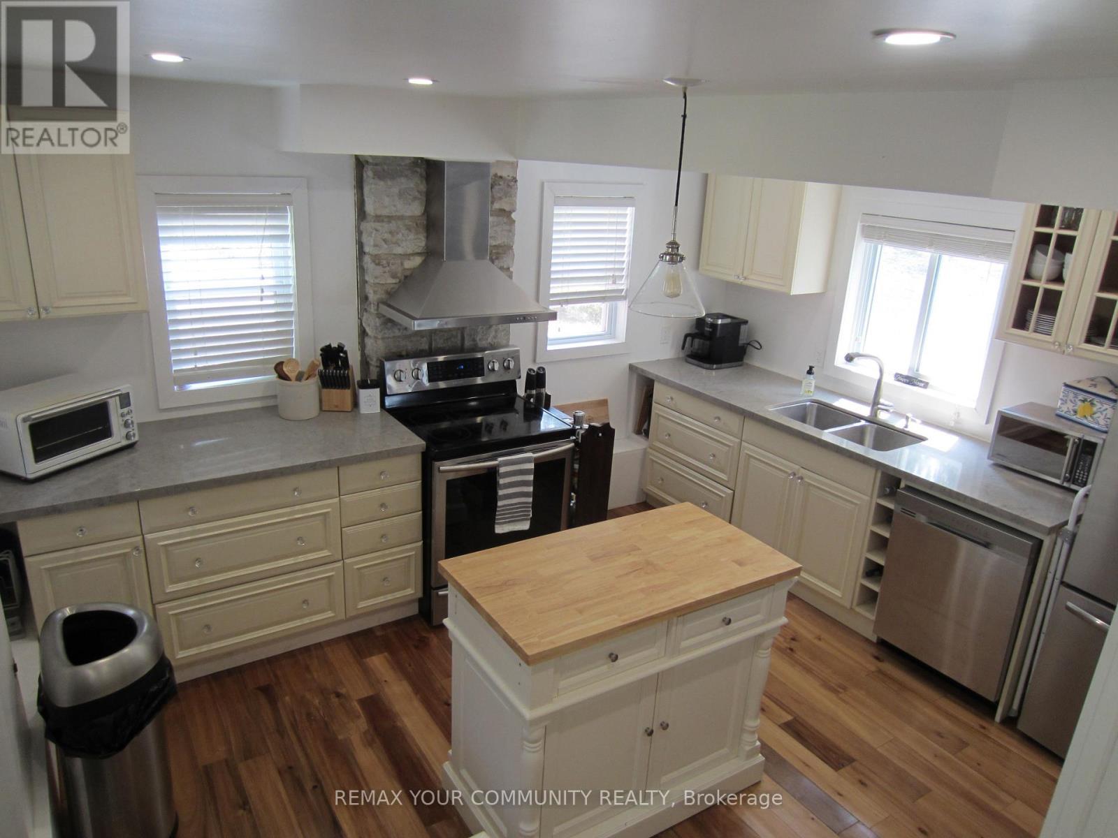 Overview of Kitchen and Island - 6576 Quarry Point Road, Ramara, ON - Indoor Photo Showing Kitchen With Double Sink