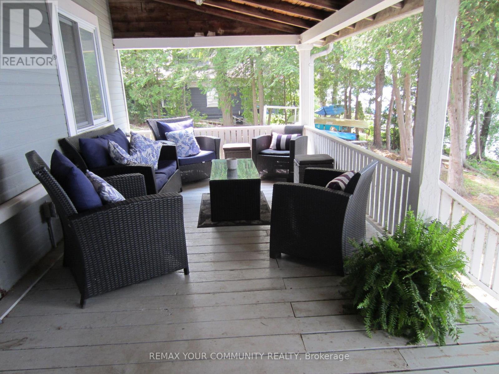 Lakeview Covered Porch for coffee,wine & Sunsets - 6576 Quarry Point Road, Ramara, ON - Outdoor With Deck Patio Veranda With Exterior