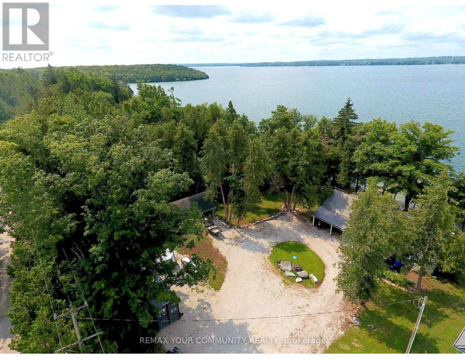 Overview of property from Road - 6576 Quarry Point Road, Ramara, ON - Outdoor With Body Of Water With View