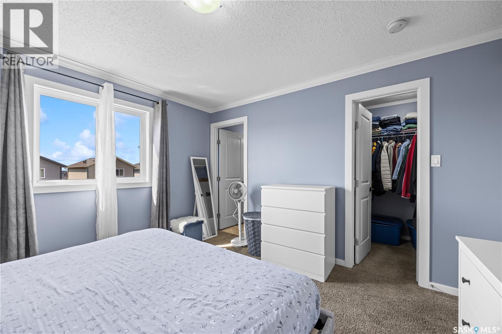 34 235 Rosewood Boulevard E, Saskatoon, SK - Indoor Photo Showing Bedroom