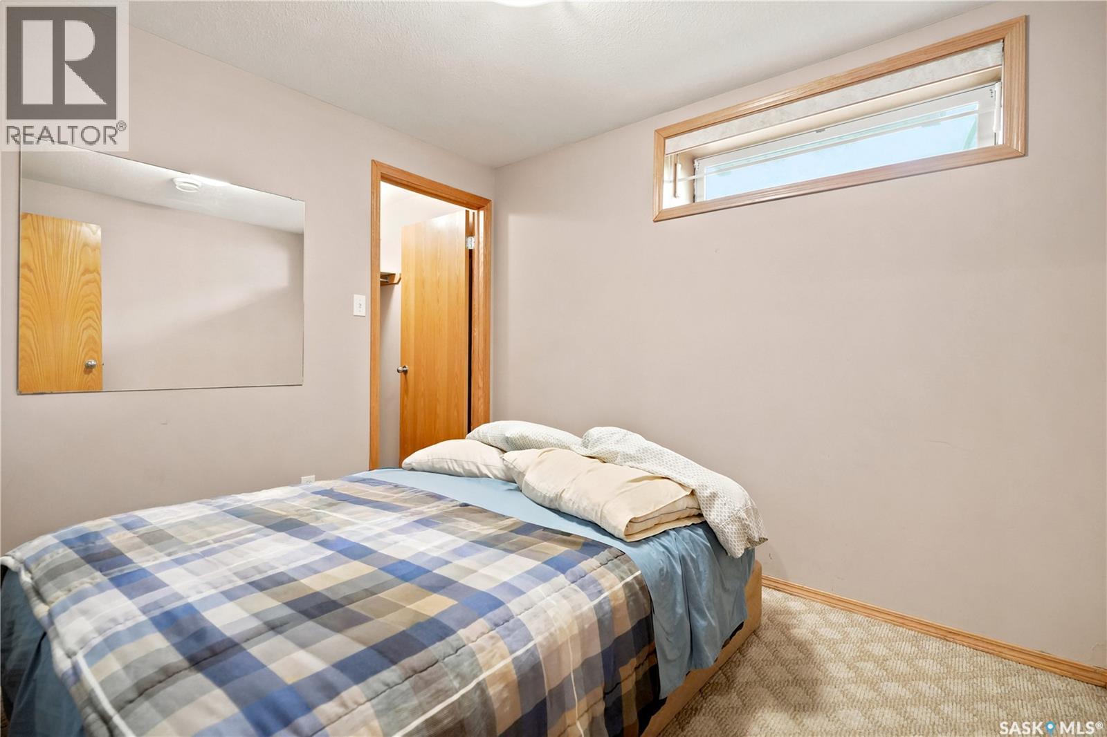 225 Mikkelson Drive, Regina, SK - Indoor Photo Showing Bedroom