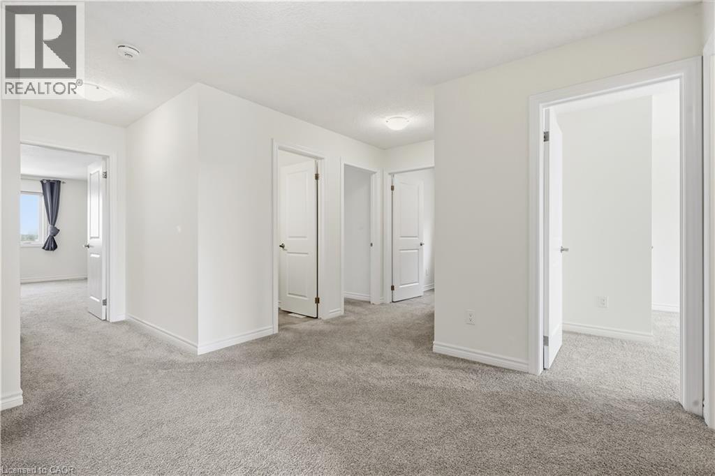 4 upstairs bedrooms, 3 full upstairs bathrooms, and upstairs laundry - 359 Beechdrops Drive, Waterloo, ON - Indoor Photo Showing Other Room