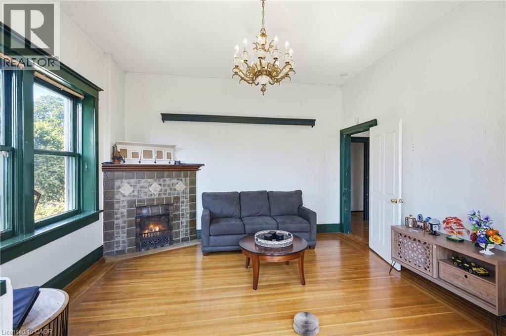 132 Emerald Street S, Hamilton, ON - Indoor Photo Showing Living Room With Fireplace