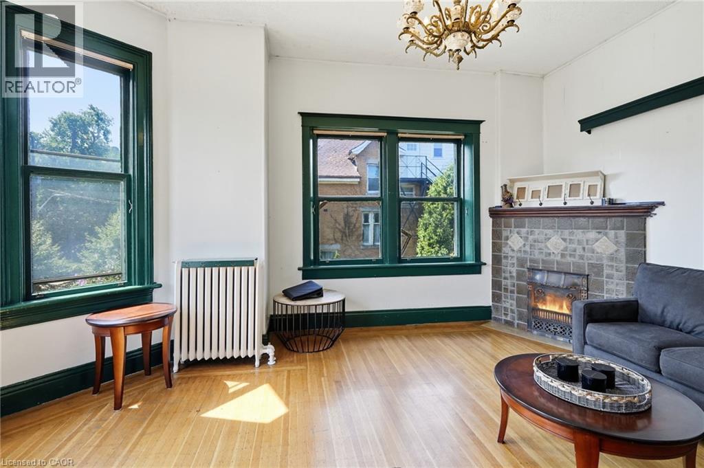 132 Emerald Street S, Hamilton, ON - Indoor Photo Showing Living Room With Fireplace