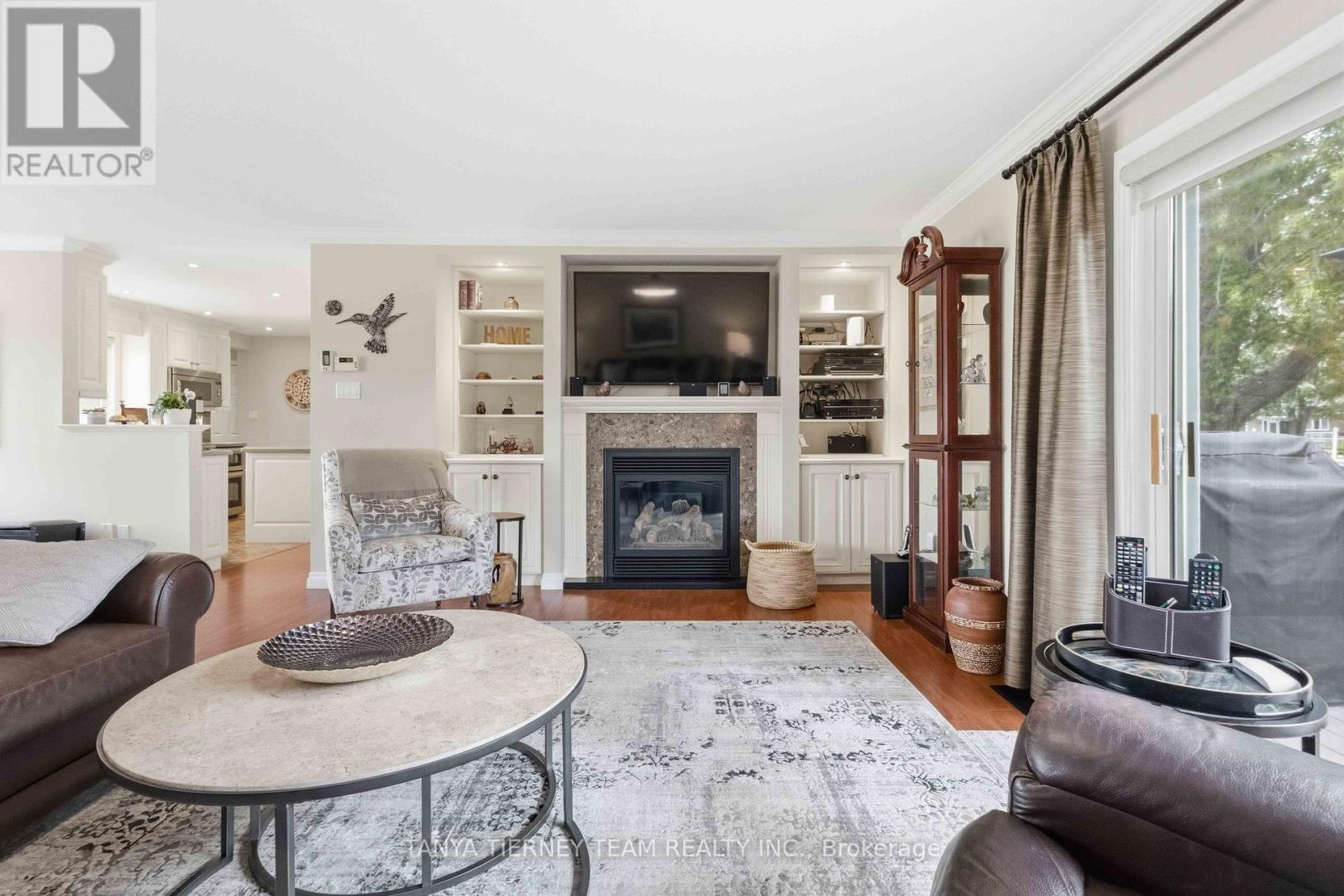 84 Turtle Path, Ramara, ON - Indoor Photo Showing Living Room With Fireplace