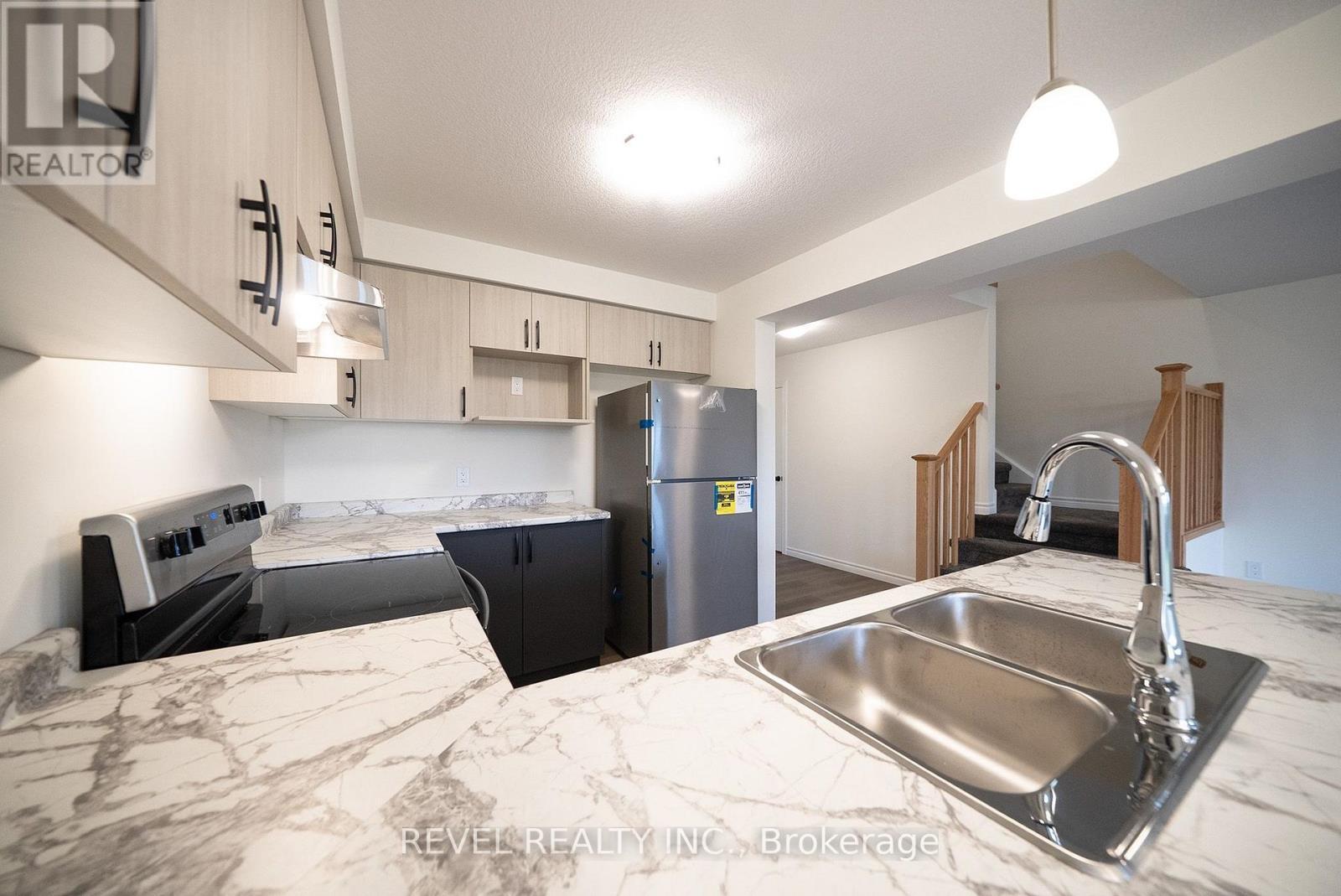 115 Mattingley Street, Brant, ON - Indoor Photo Showing Kitchen With Double Sink
