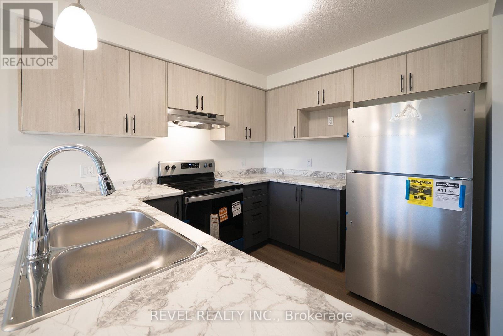 115 Mattingley Street, Brant, ON - Indoor Photo Showing Kitchen With Double Sink