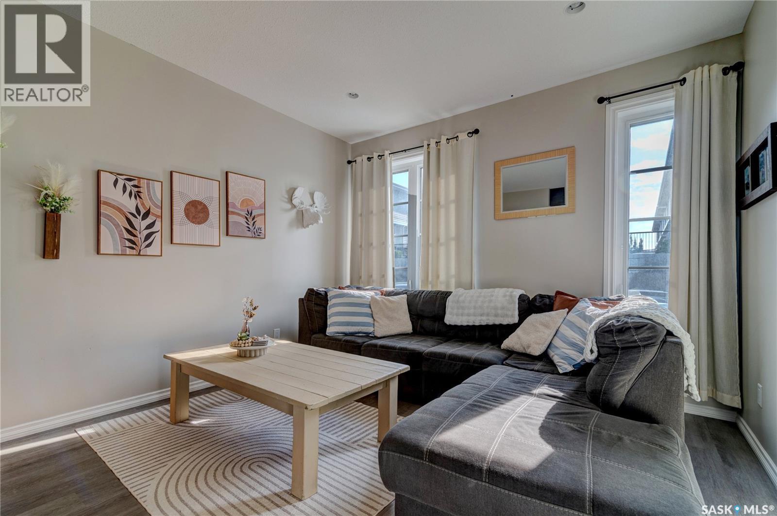 137 3229 Elgaard Drive, Regina, SK - Indoor Photo Showing Living Room
