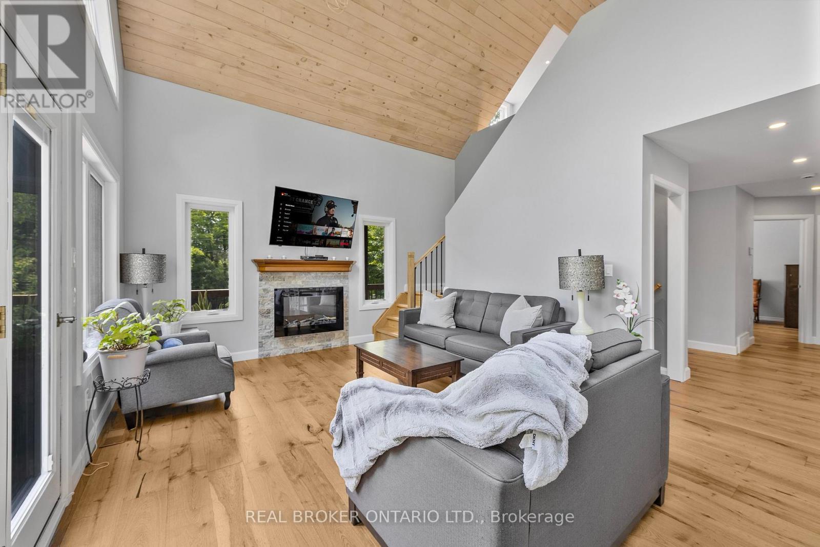 1 Mckowen Road, Mckellar, ON - Indoor Photo Showing Living Room With Fireplace