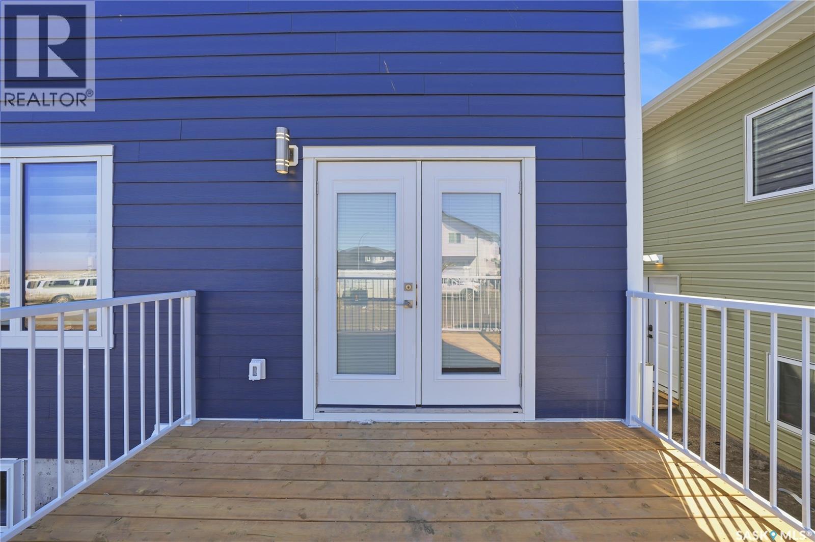 143 Sharma Lane, Saskatoon, SK - Outdoor With Deck Patio Veranda With Exterior