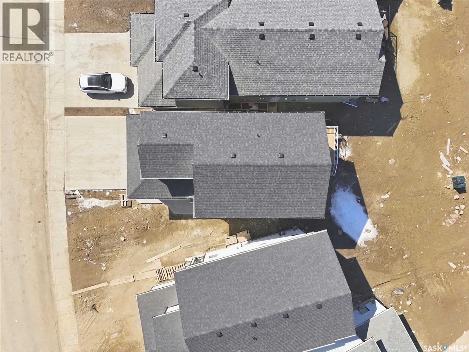 143 Sharma Lane, Saskatoon, SK - Outdoor With Deck Patio Veranda
