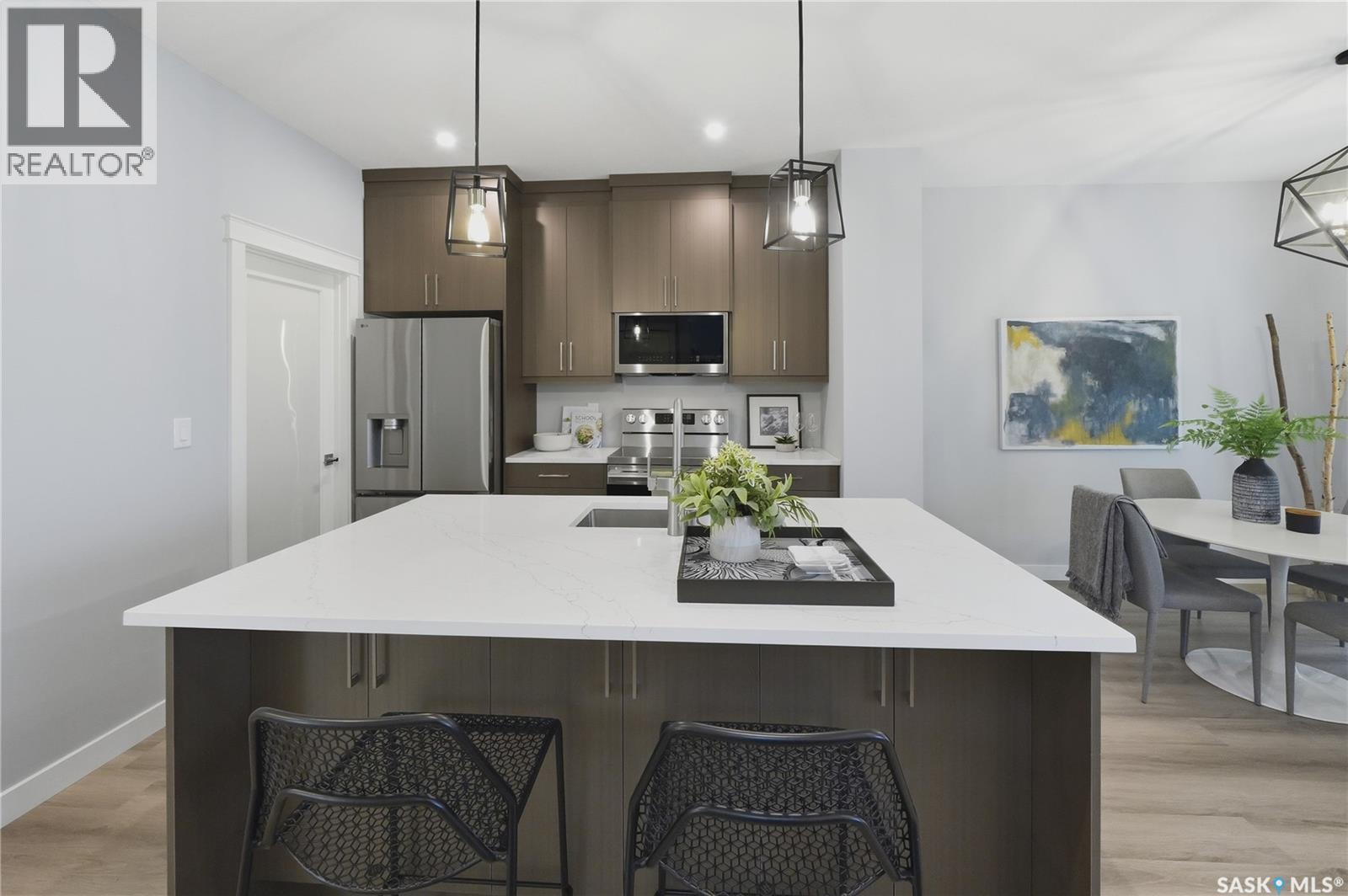 143 Sharma Lane, Saskatoon, SK - Indoor Photo Showing Kitchen With Upgraded Kitchen