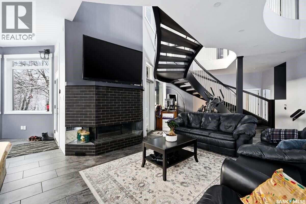 3601 Grassick Avenue, Regina, SK - Indoor Photo Showing Living Room With Fireplace