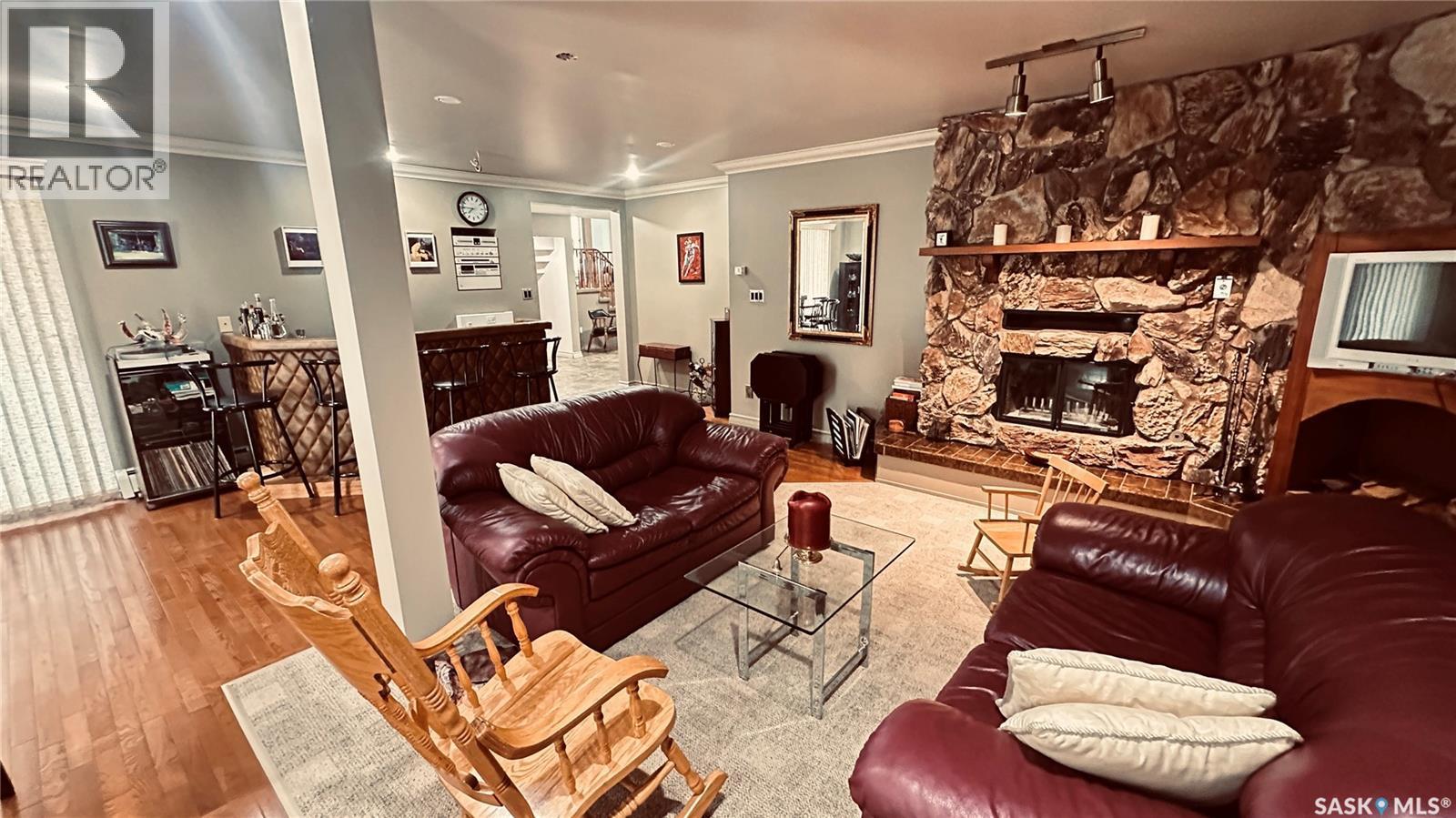816 1St Avenue, Zenon Park, SK - Indoor Photo Showing Living Room With Fireplace