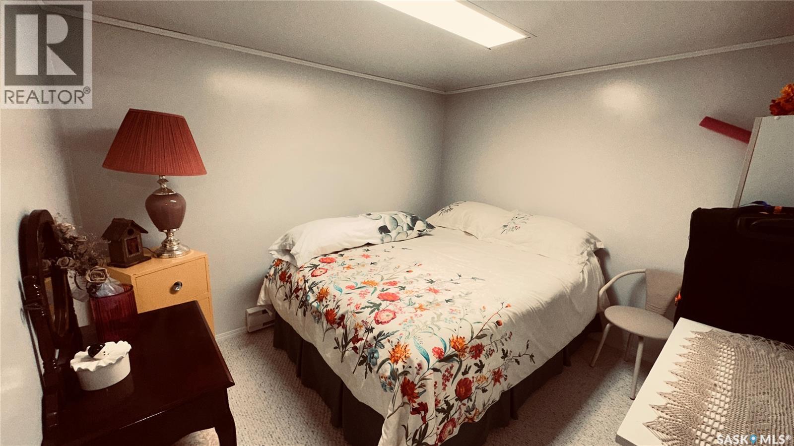 816 1St Avenue, Zenon Park, SK - Indoor Photo Showing Bedroom