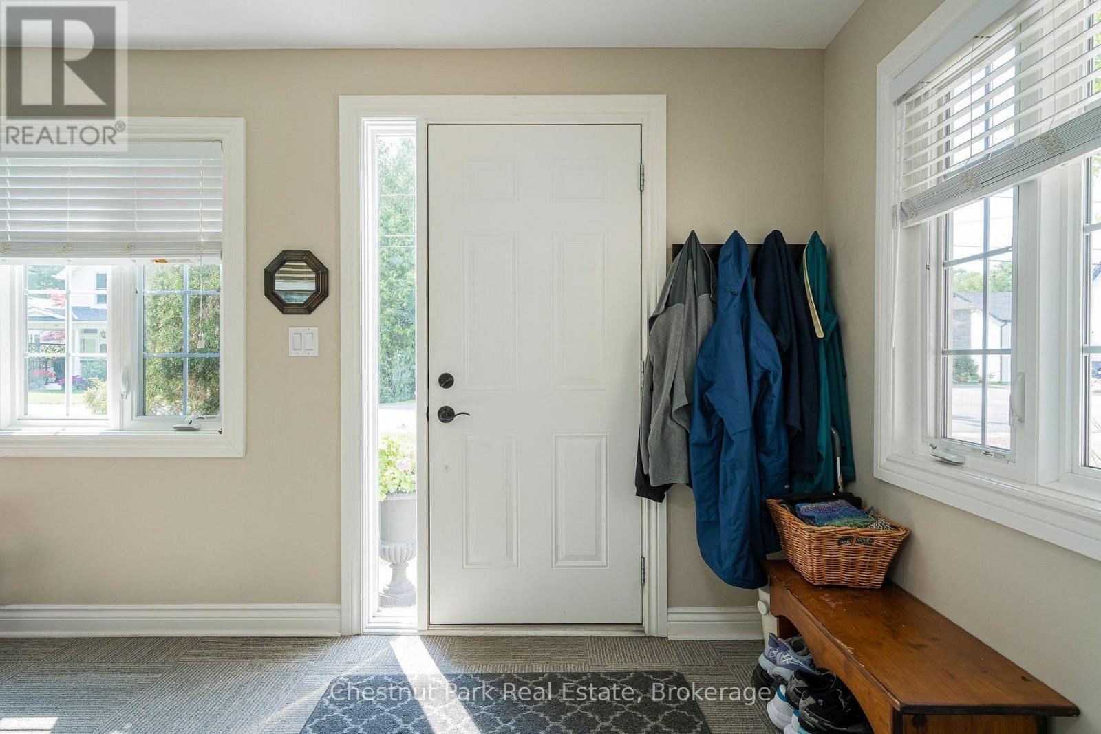 Welcoming front mudroom with heated floor - 71 Hickory Street, Collingwood, ON - Indoor Photo Showing Other Room