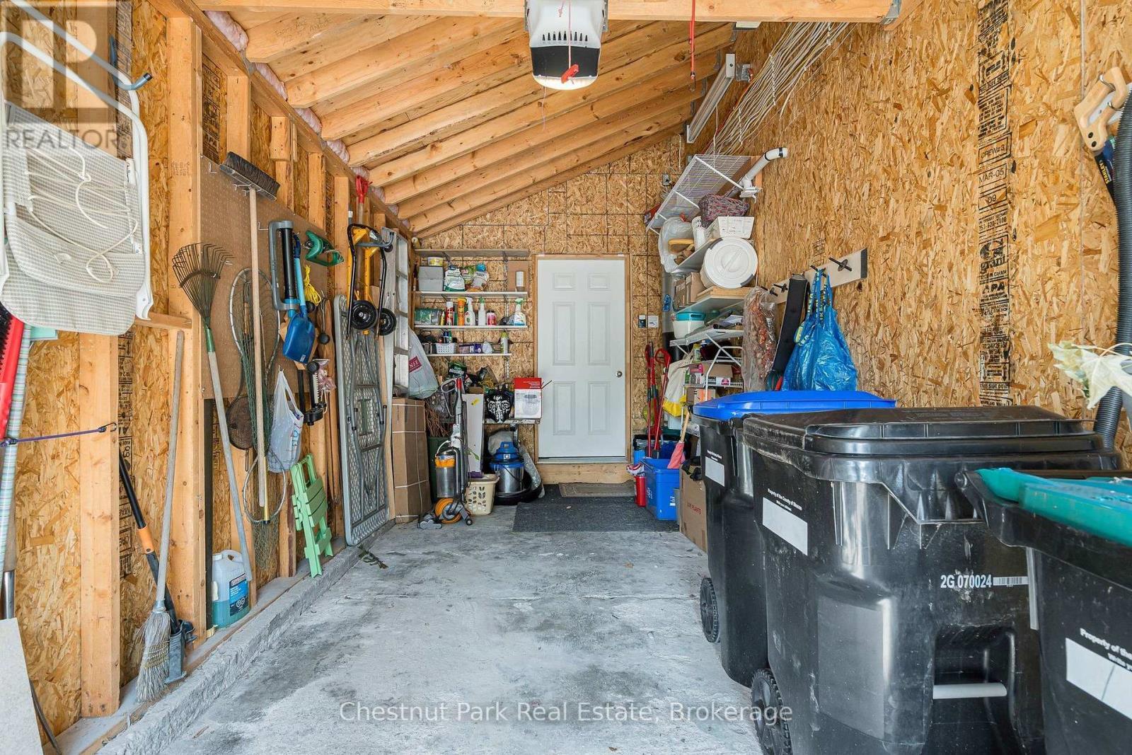 Single car garage with inside access to the house - 71 Hickory Street, Collingwood, ON - Indoor Photo Showing Basement