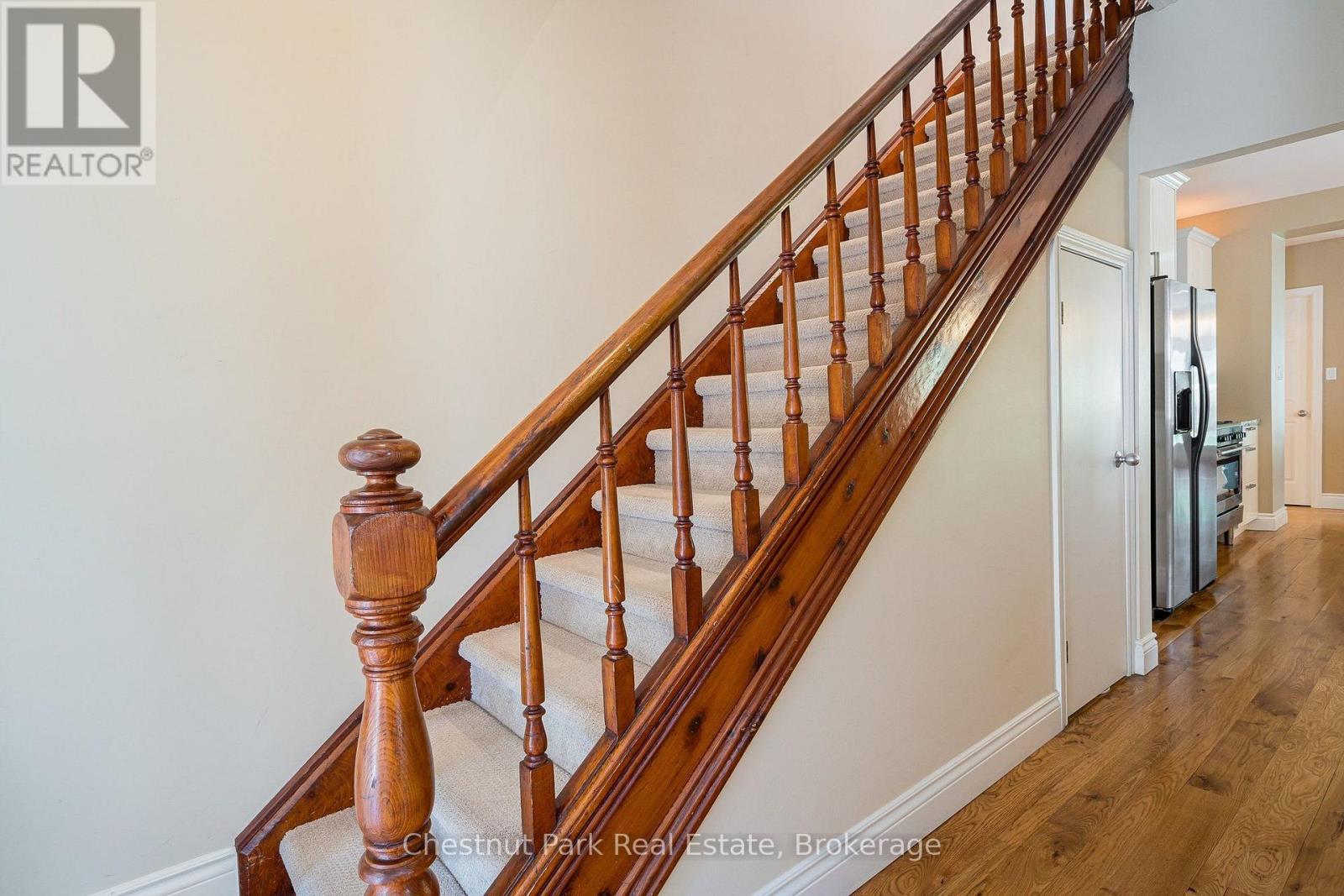 Stairs to 2nd flr - pantry storage under stairs - 71 Hickory Street, Collingwood, ON - Indoor Photo Showing Other Room