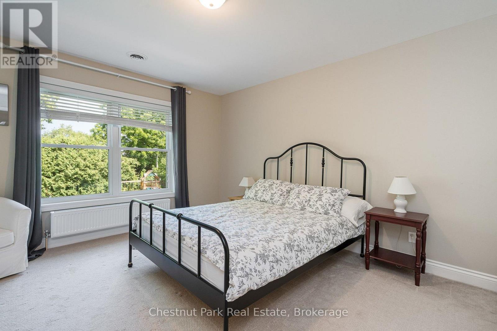2nd flr primary bdrm at the back of the house - 71 Hickory Street, Collingwood, ON - Indoor Photo Showing Bedroom