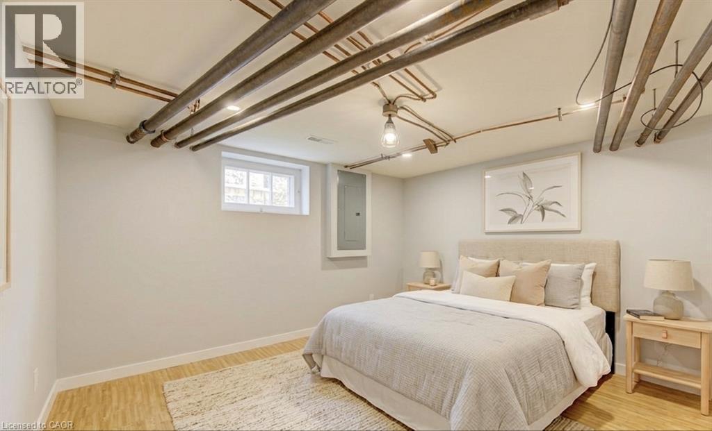 (virtually staged) basement recreation room staged as finished bedroom. although many uses for this space - 150 Union Boulevard, Kitchener, ON - Indoor Photo Showing Bedroom