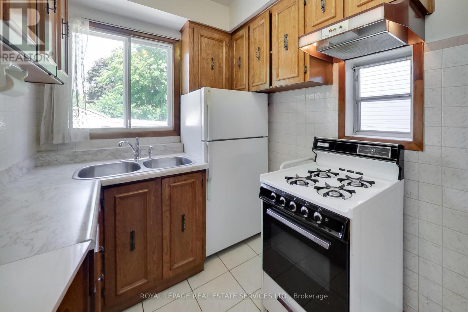 85 Dawes Road, Toronto, ON - Indoor Photo Showing Kitchen With Double Sink