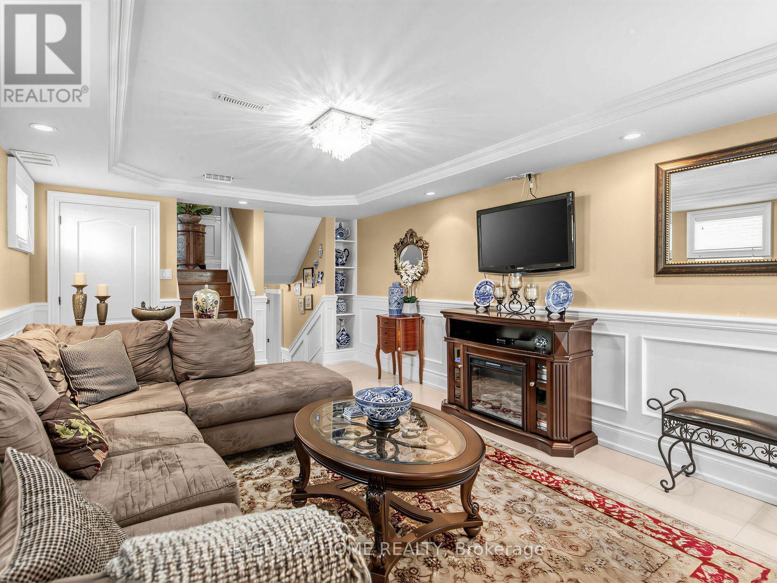 2 Grenadine Court, Toronto, ON - Indoor Photo Showing Living Room With Fireplace
