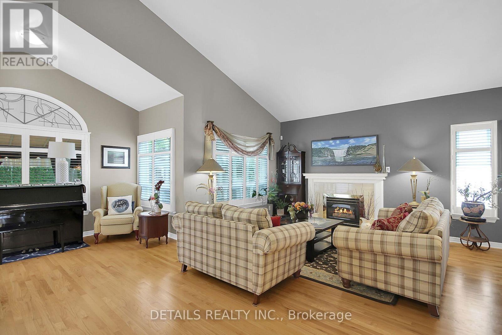65 Kimberwick Crescent, Ottawa, ON - Indoor Photo Showing Living Room With Fireplace
