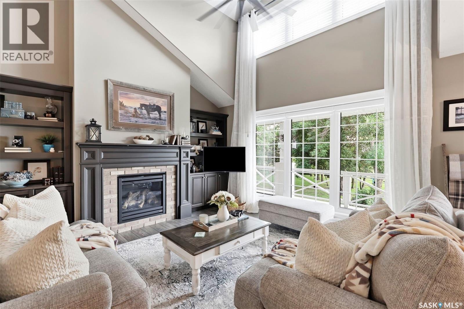 Rural Address / Naismith Acreage, Young, SK - Indoor Photo Showing Living Room With Fireplace