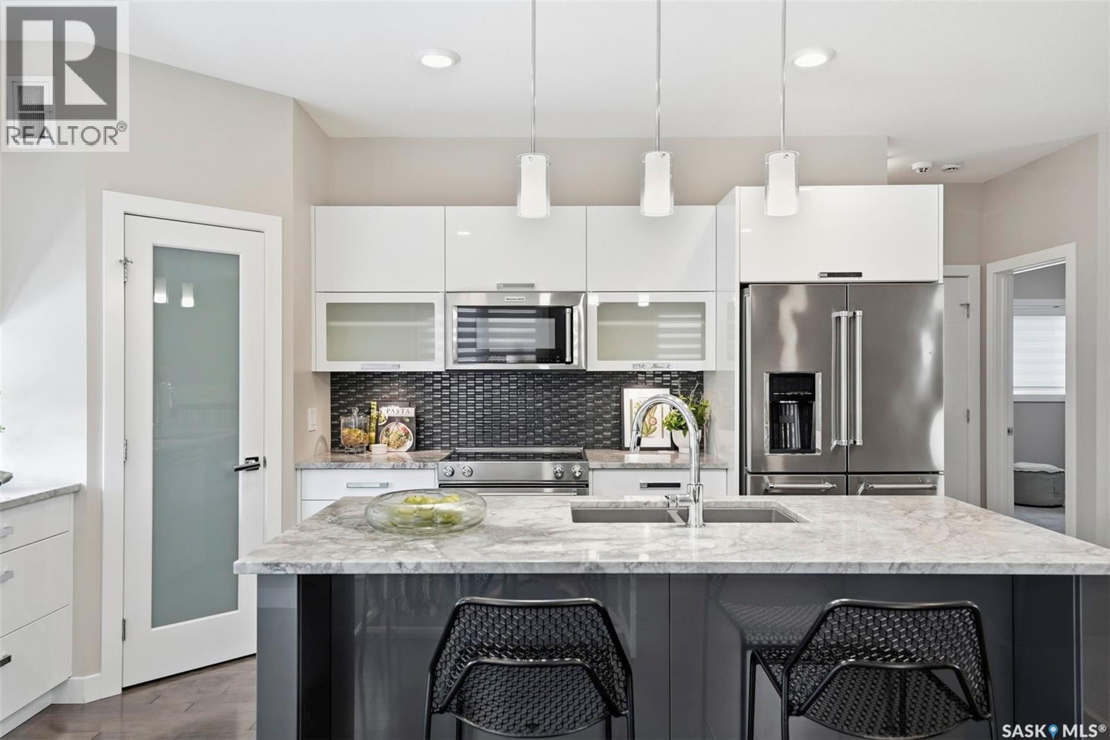130 Boykowich Bend, Saskatoon, SK - Indoor Photo Showing Kitchen With Stainless Steel Kitchen With Upgraded Kitchen