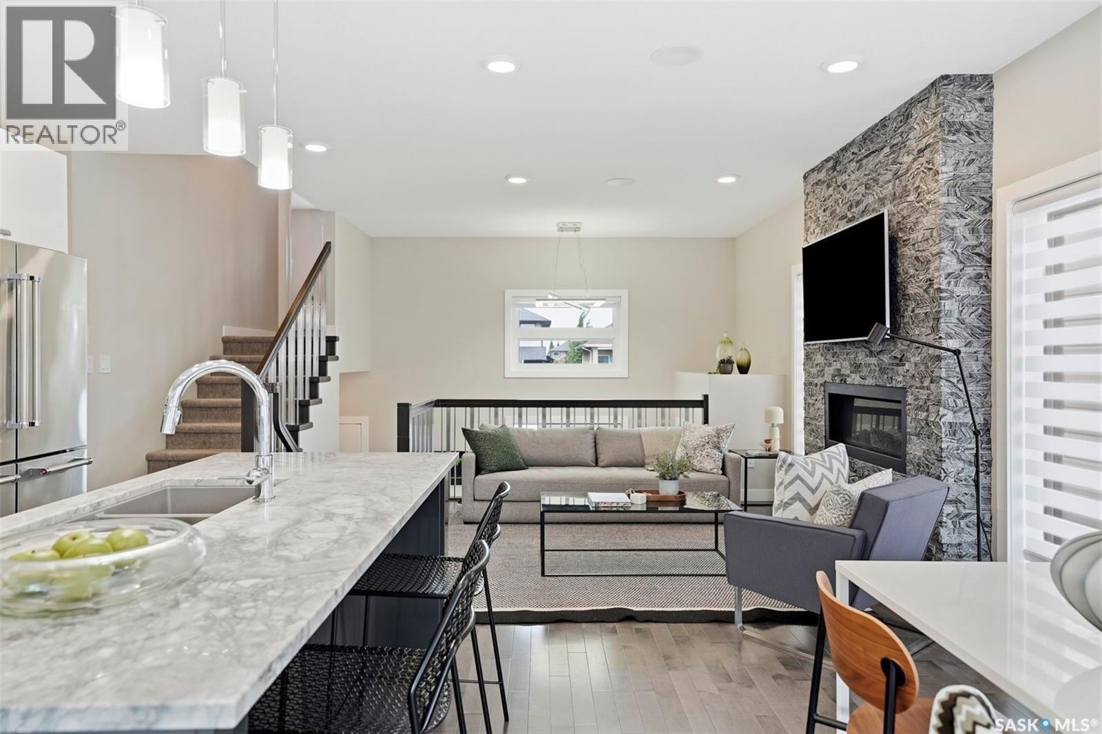 130 Boykowich Bend, Saskatoon, SK - Indoor With Fireplace