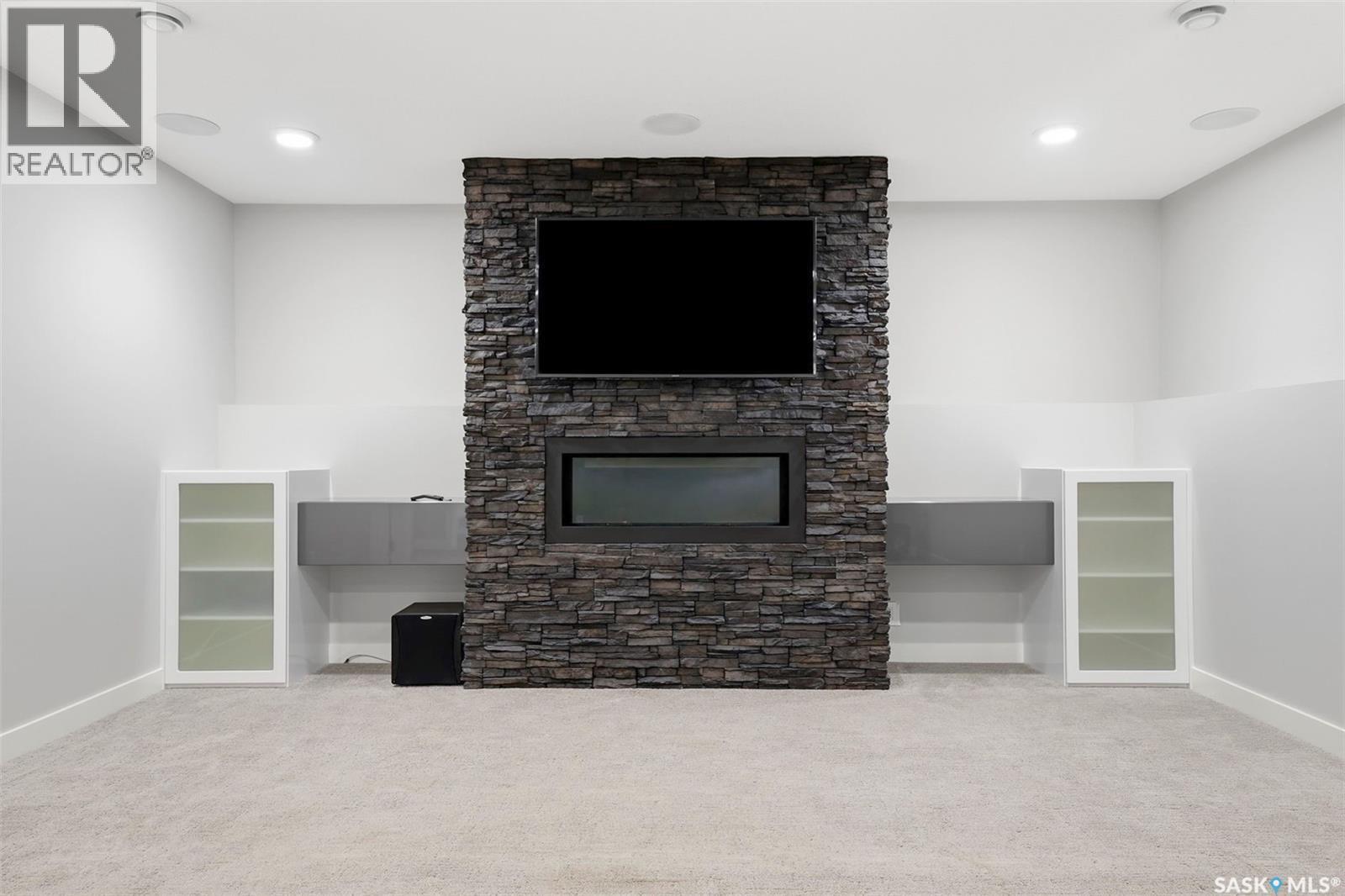 130 Boykowich Bend, Saskatoon, SK - Indoor With Fireplace