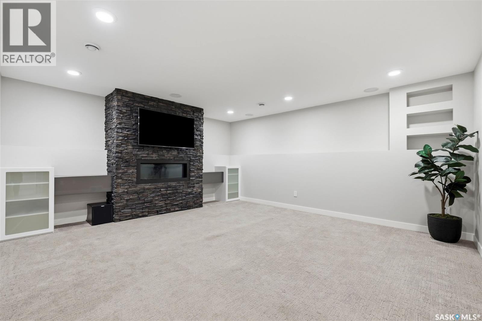 130 Boykowich Bend, Saskatoon, SK - Indoor With Fireplace