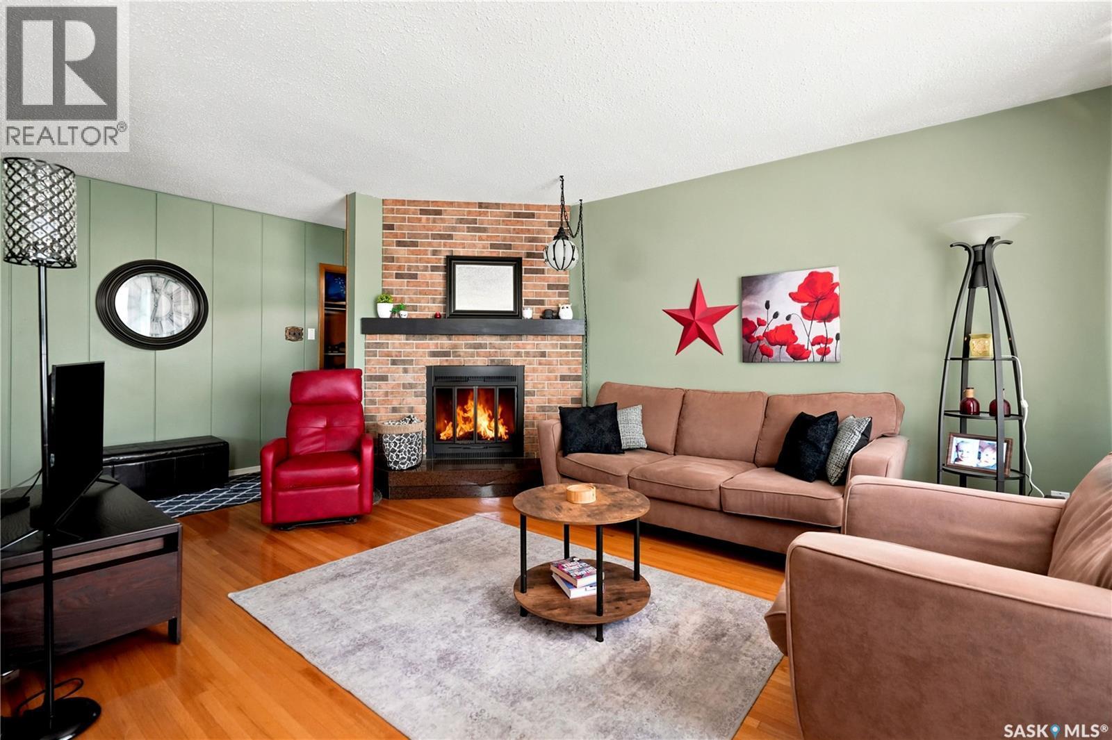 323 Toronto Street N, Regina, SK - Indoor Photo Showing Living Room With Fireplace