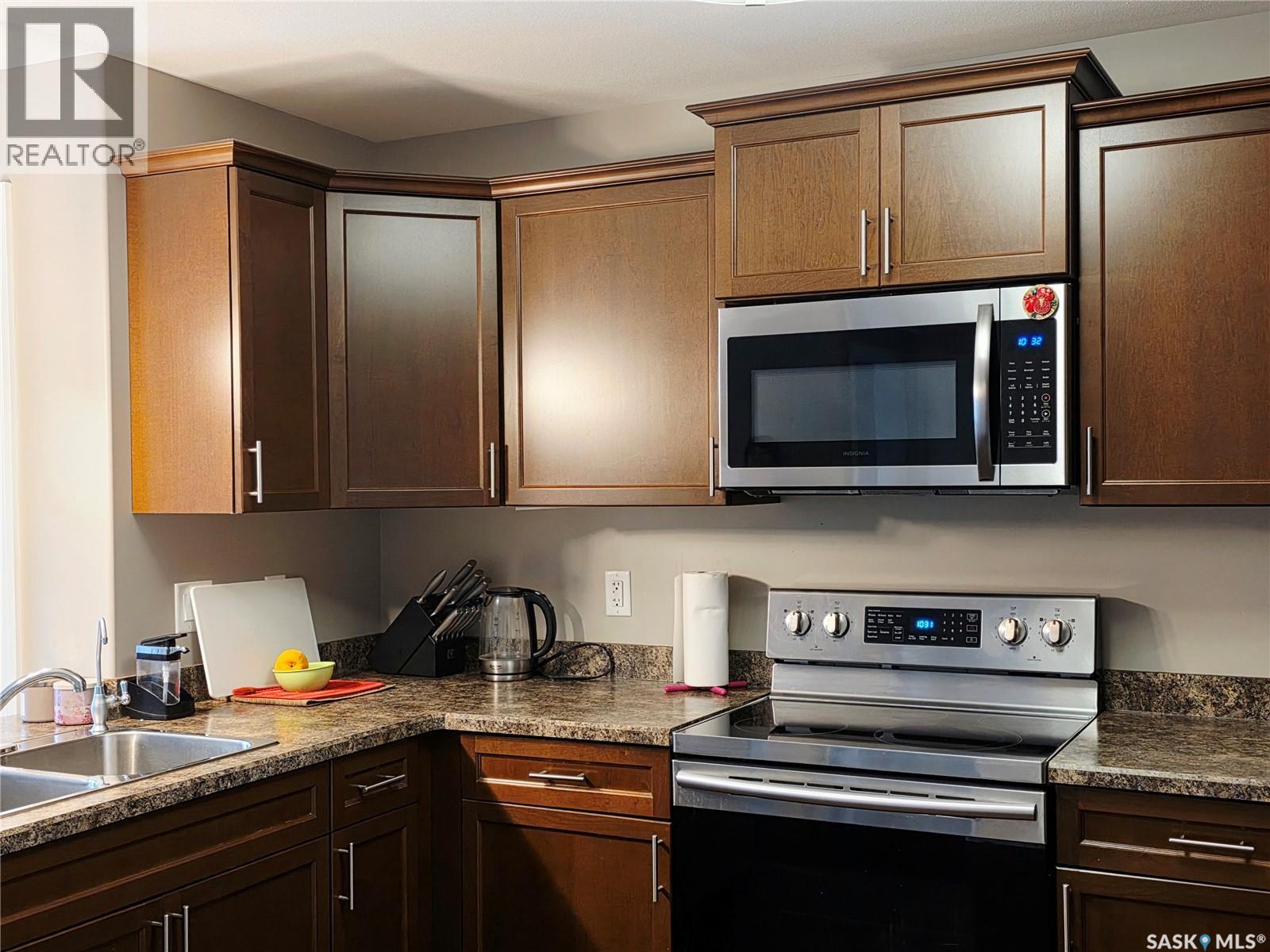 106 3630 Haughton Road E, Regina, SK - Indoor Photo Showing Kitchen