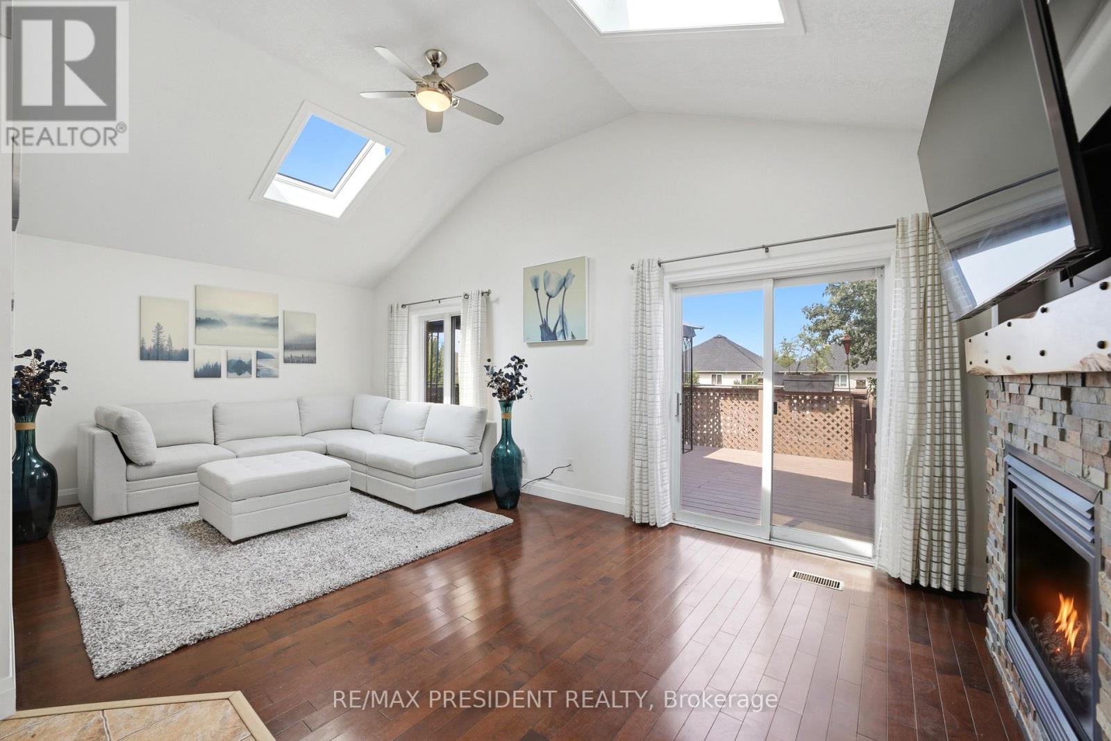 60 Steepleridge Street, Kitchener, ON - Indoor Photo Showing Living Room With Fireplace