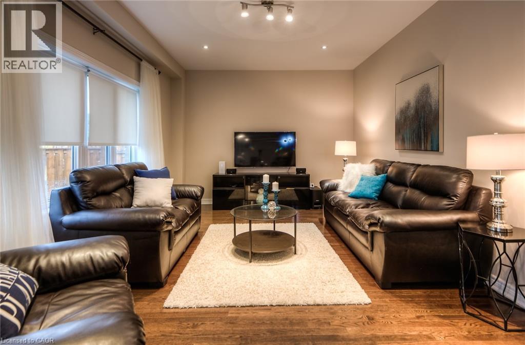 102 Coopershawk Street, Kitchener, ON - Indoor Photo Showing Living Room