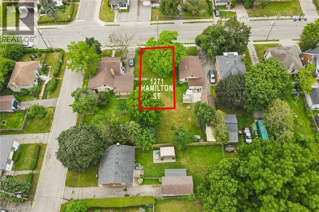 1271 Hamilton Street features a substantial corner lot with mature landscaping, lush tree coverage, and expansive grounds - 1271 Hamilton Street, Cambridge, ON