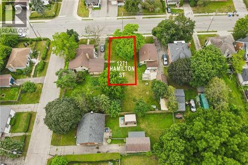 1271 Hamilton Street features a substantial corner lot with mature landscaping, lush tree coverage, and expansive grounds - 1271 Hamilton Street, Cambridge, ON 