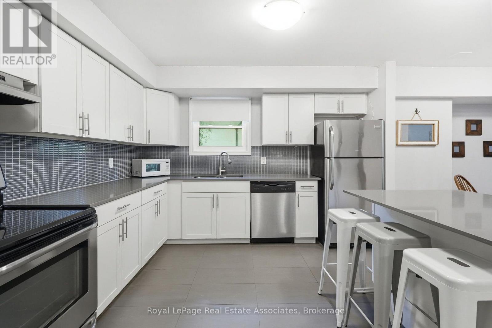 1 - 509 Quiet Place, Waterloo, ON - Indoor Photo Showing Kitchen With Double Sink