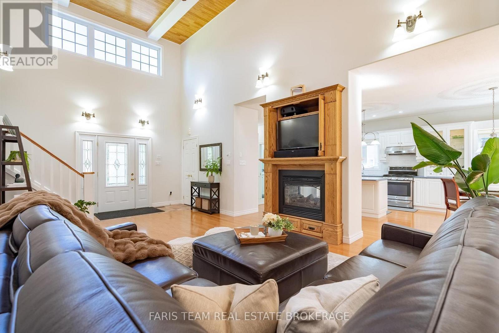 91 Maryjane Road, Tiny, ON - Indoor Photo Showing Living Room With Fireplace