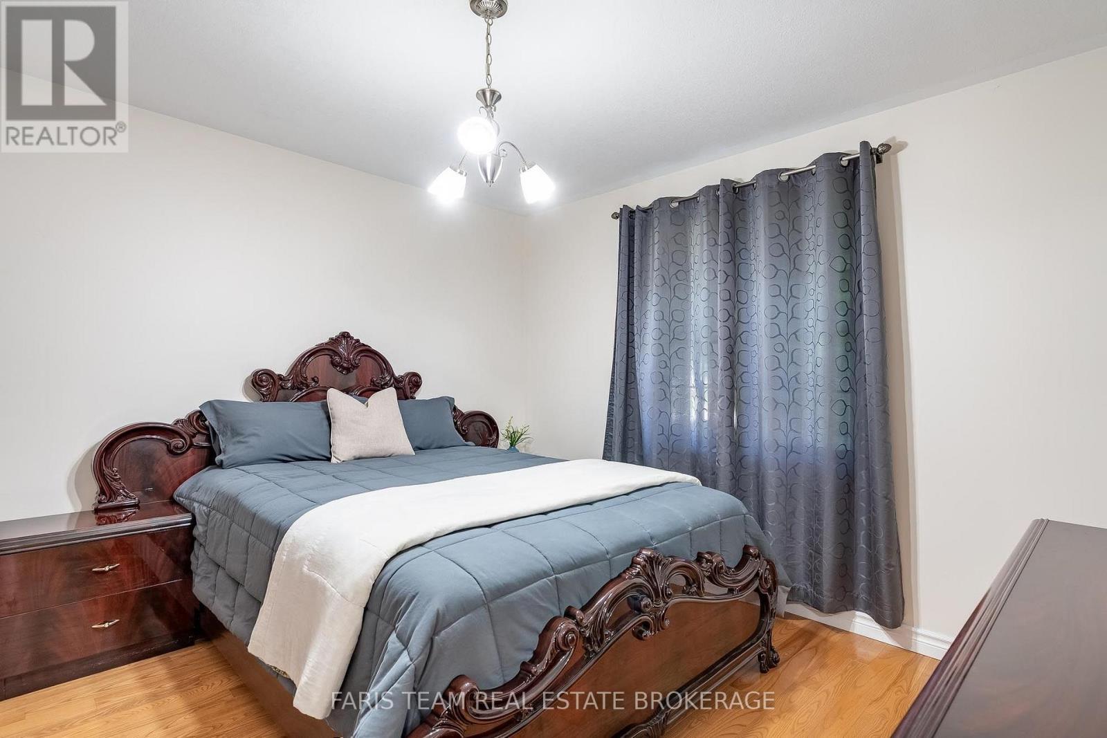 91 Maryjane Road, Tiny, ON - Indoor Photo Showing Bedroom