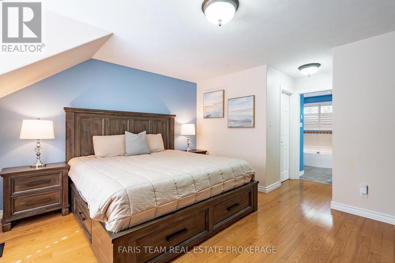 91 Maryjane Road, Tiny, ON - Indoor Photo Showing Bedroom