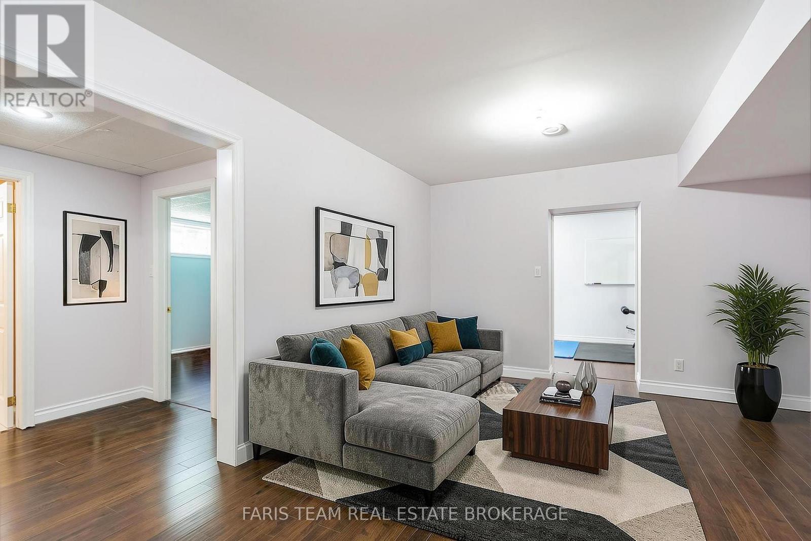 Virtually staged - 91 Maryjane Road, Tiny, ON - Indoor Photo Showing Living Room