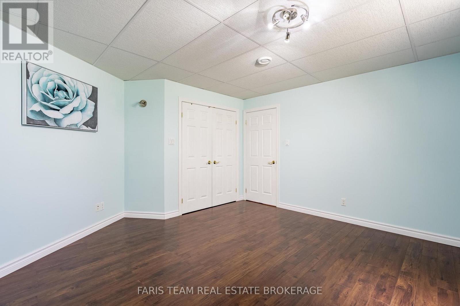 91 Maryjane Road, Tiny, ON - Indoor Photo Showing Other Room