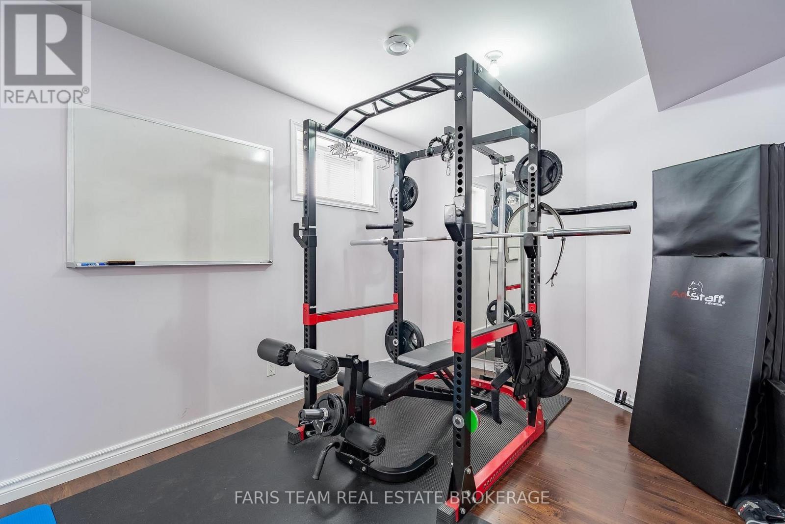 91 Maryjane Road, Tiny, ON - Indoor Photo Showing Gym Room