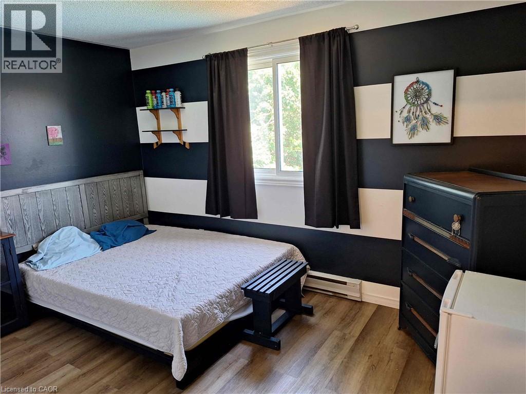 48 Crestlynn Crescent, Simcoe, ON - Indoor Photo Showing Bedroom