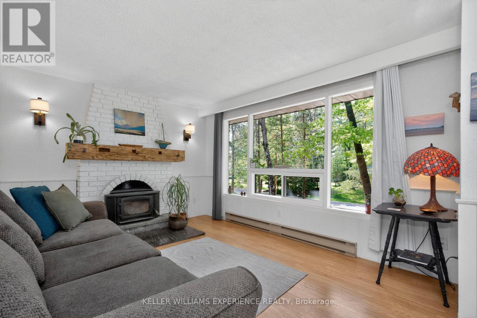 181 Park Road, Tiny, ON - Indoor Photo Showing Living Room With Fireplace